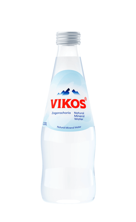 small glass bottles with vikos natural mineral water 330ml